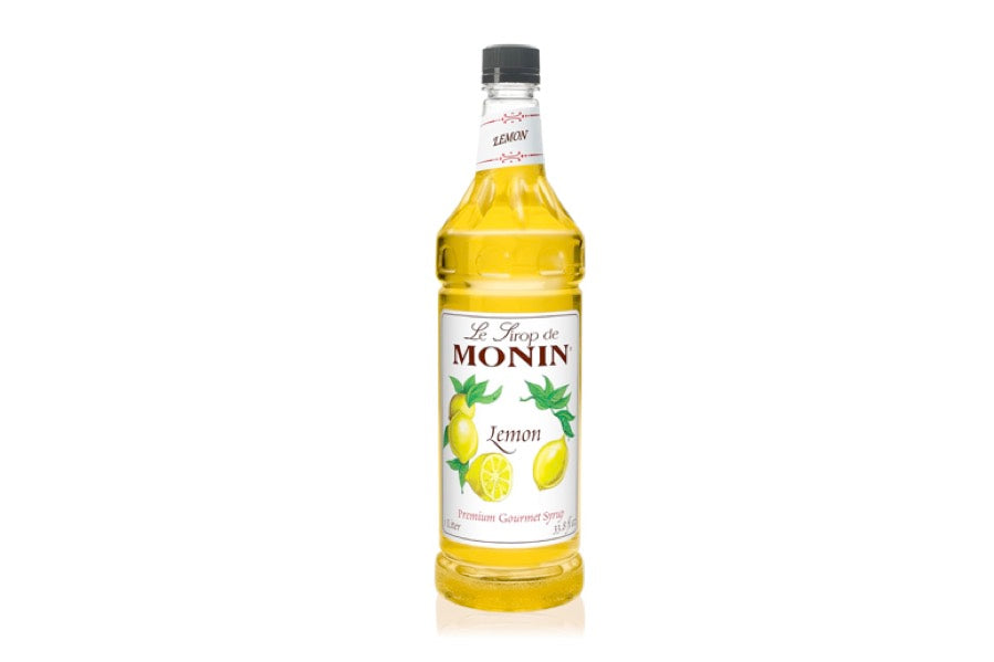 Monin Premium Lemon Syrup in a 750ml glass bottle with yellow label, ideal for drinks and desserts on sale now
